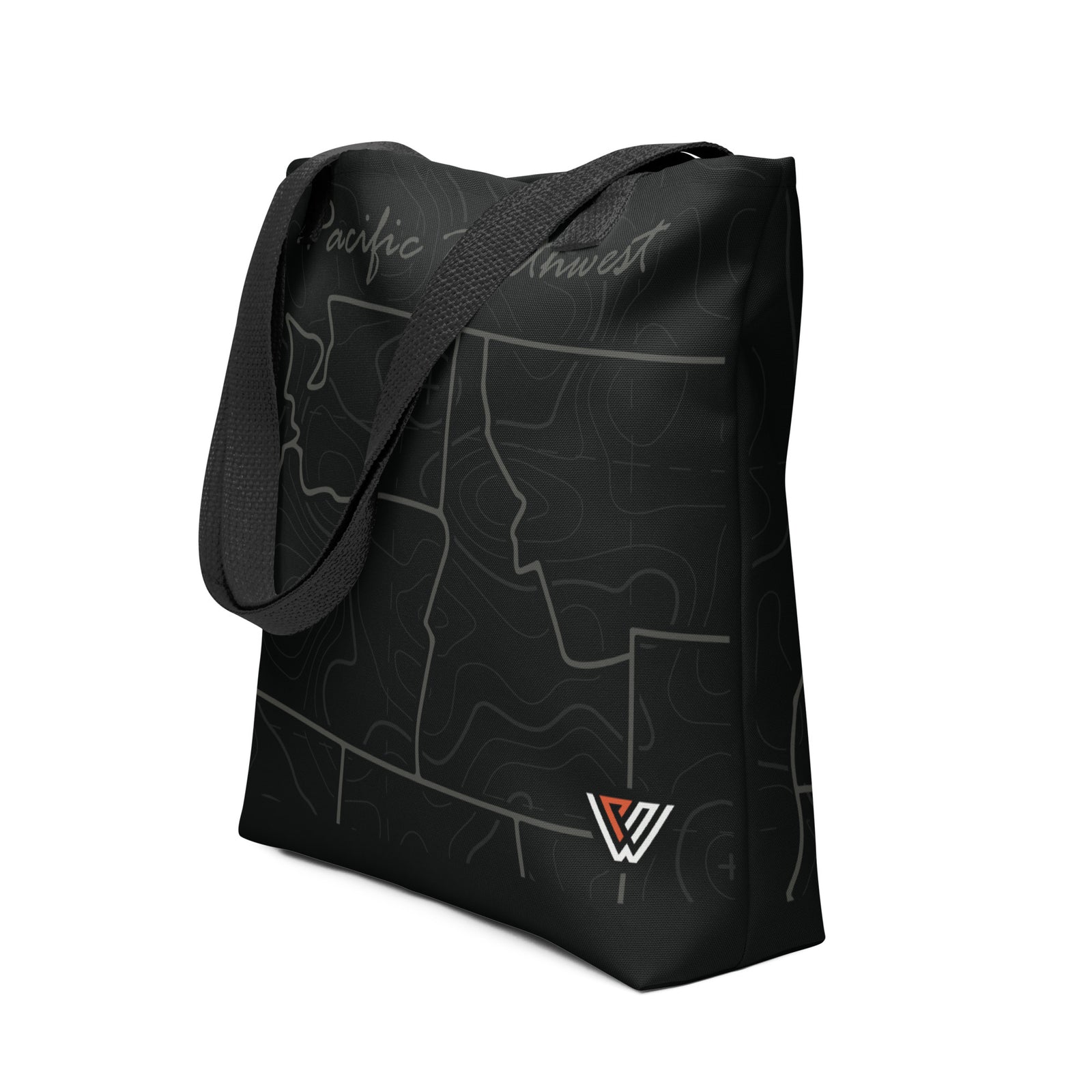 Black tote bag with outlined Pacific Northwest states over a topgraphical map and the 'PNW Kyne' logo on a white background