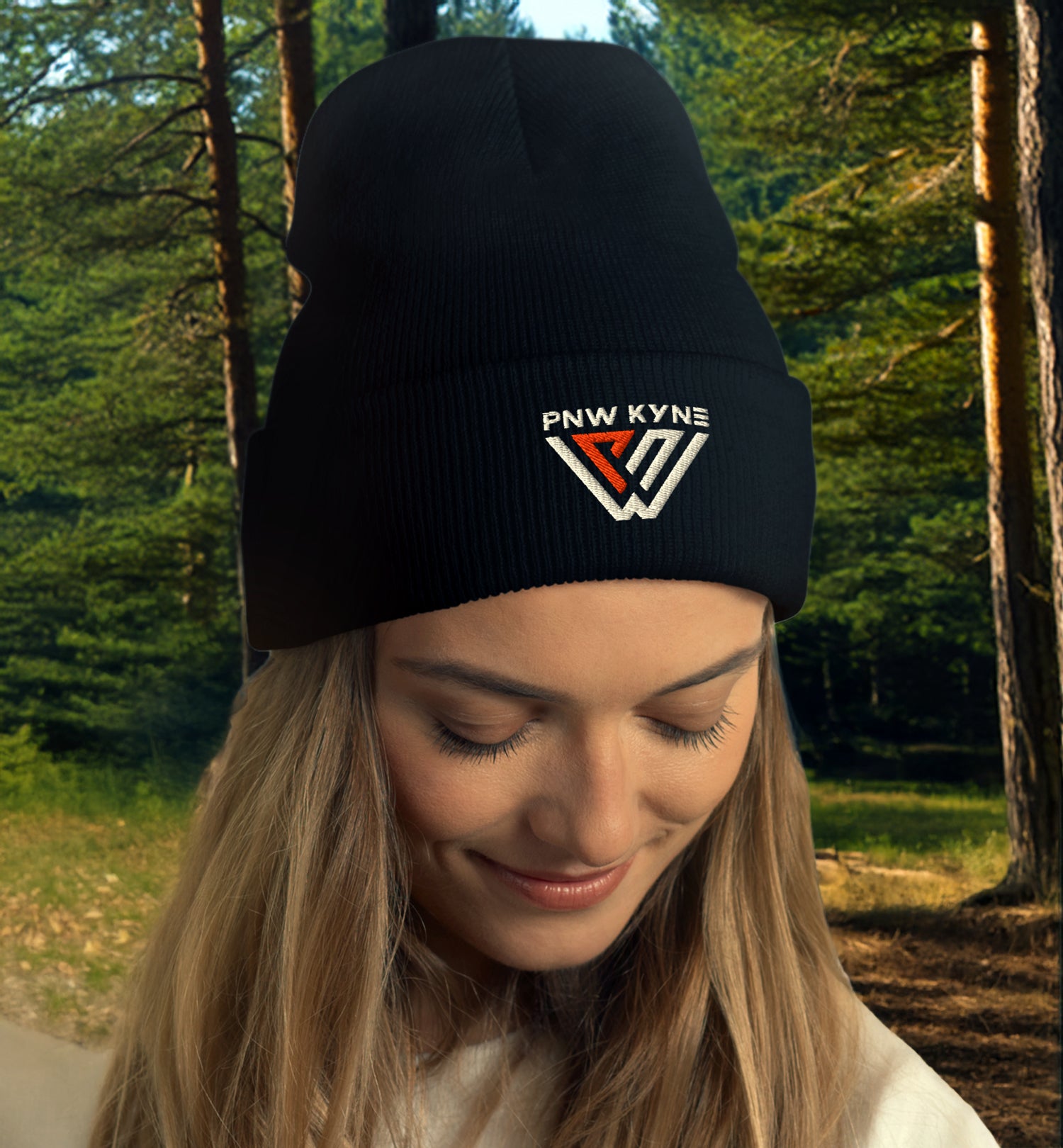 Woman wearing a PNW KYNE Classic Logo Beanie in the forest