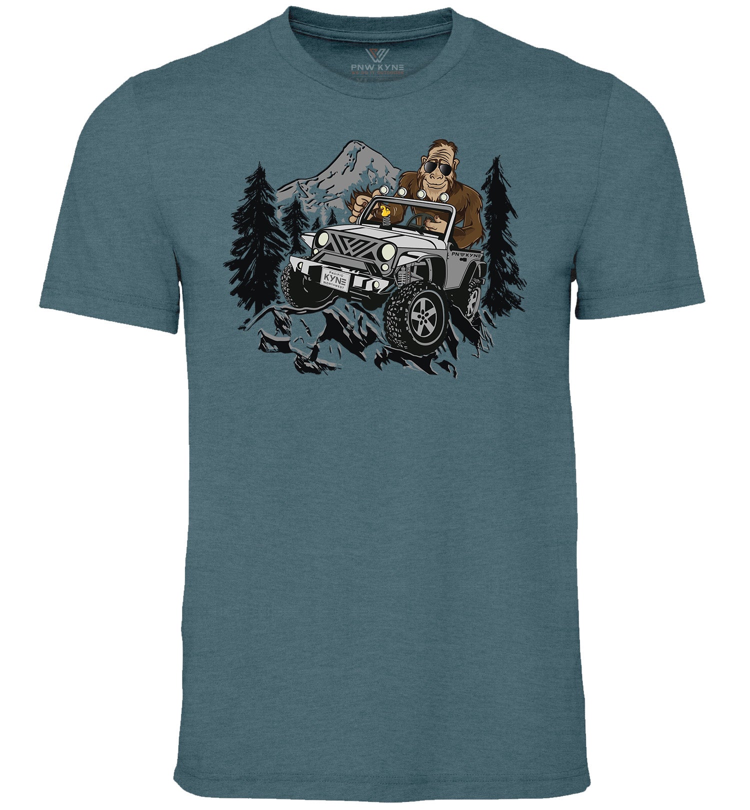 A short sleeve crew neck t-shirt in blue color with an illustration of Bigfoot driving a jeep style vehicle with a mountain and forest backdrop.