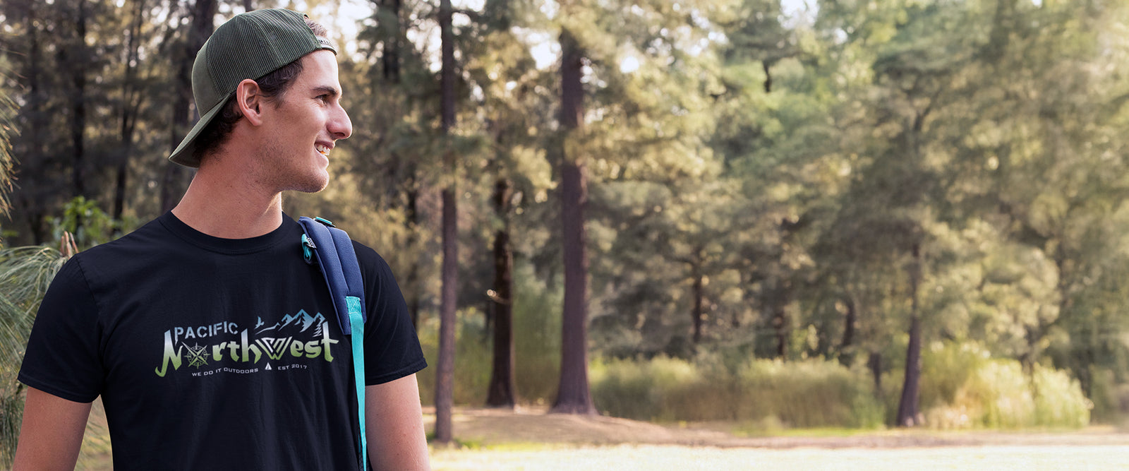 Summer image of a man wearing a Northwest Skyline shirt