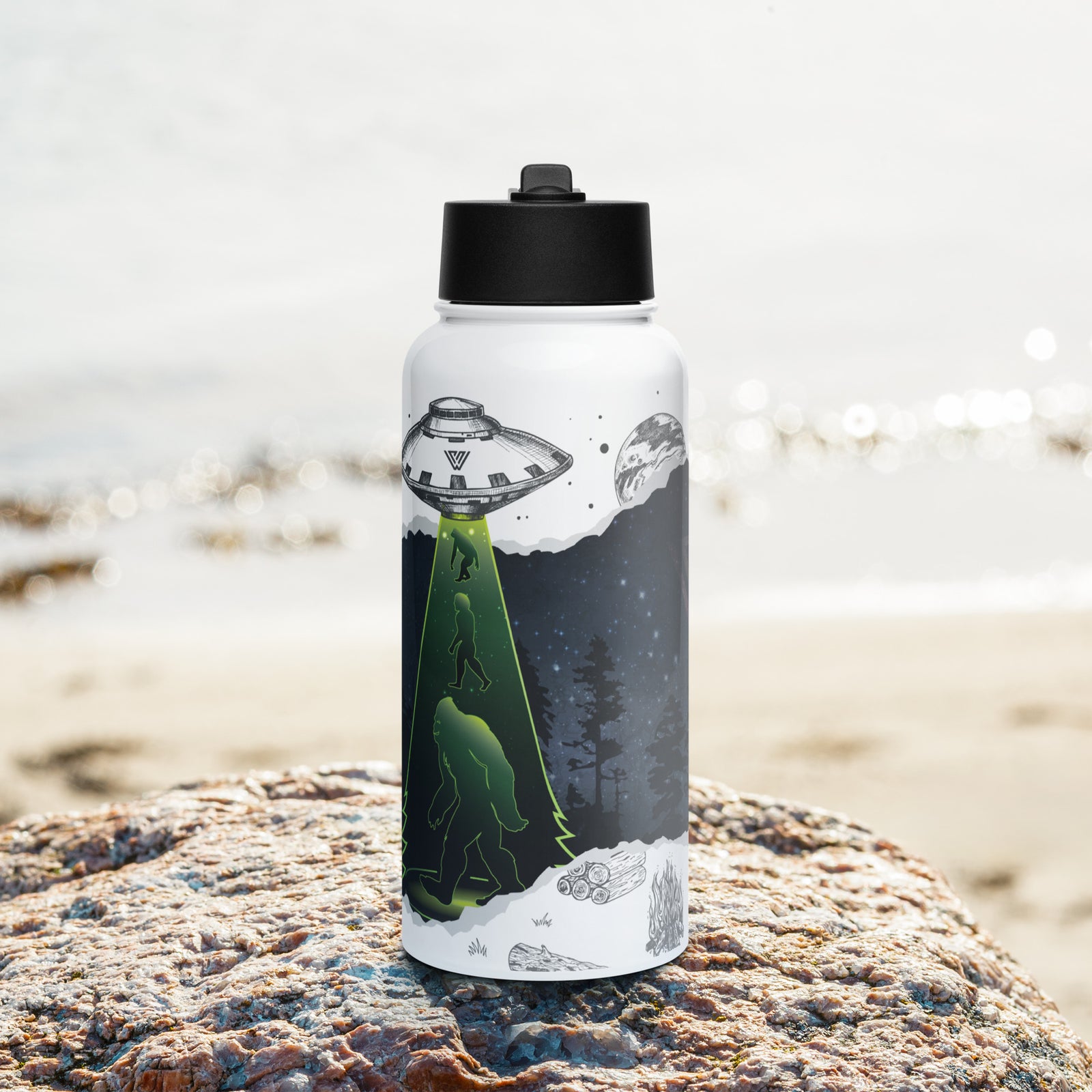 A 32 oz stainless steel water bottle with a scientific fiction design featuring a sasquatch, UFO, and night sky.