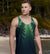 Man on a beach with a PNW tank top