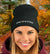 Woman wearing a PNW KYNE Logo Beanie