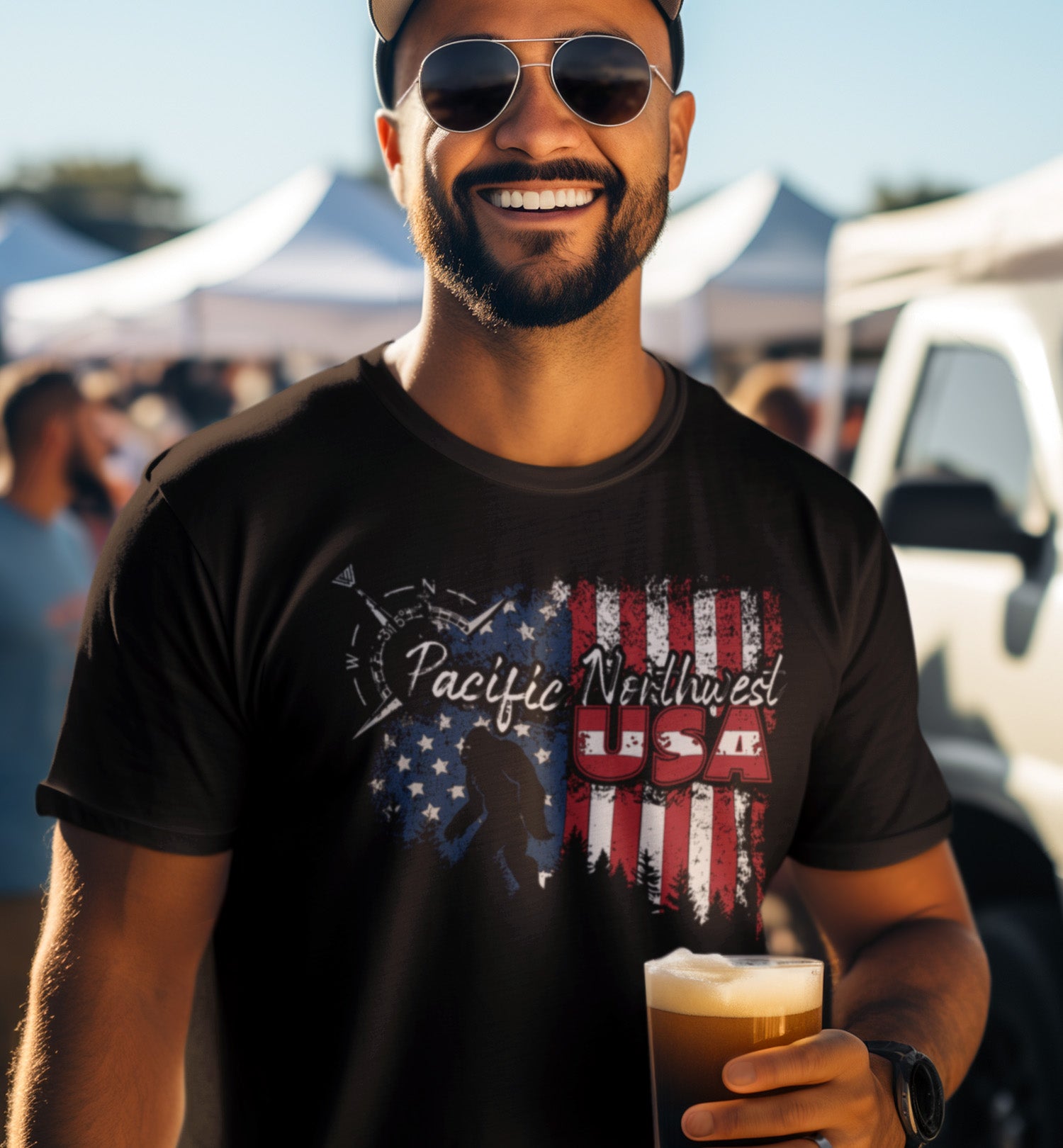 Man at a PNW festival with a Bigfoot Pacific Northwest USA shirt