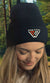 Woman wearing a PNW KYNE Classic Logo Beanie in the forest